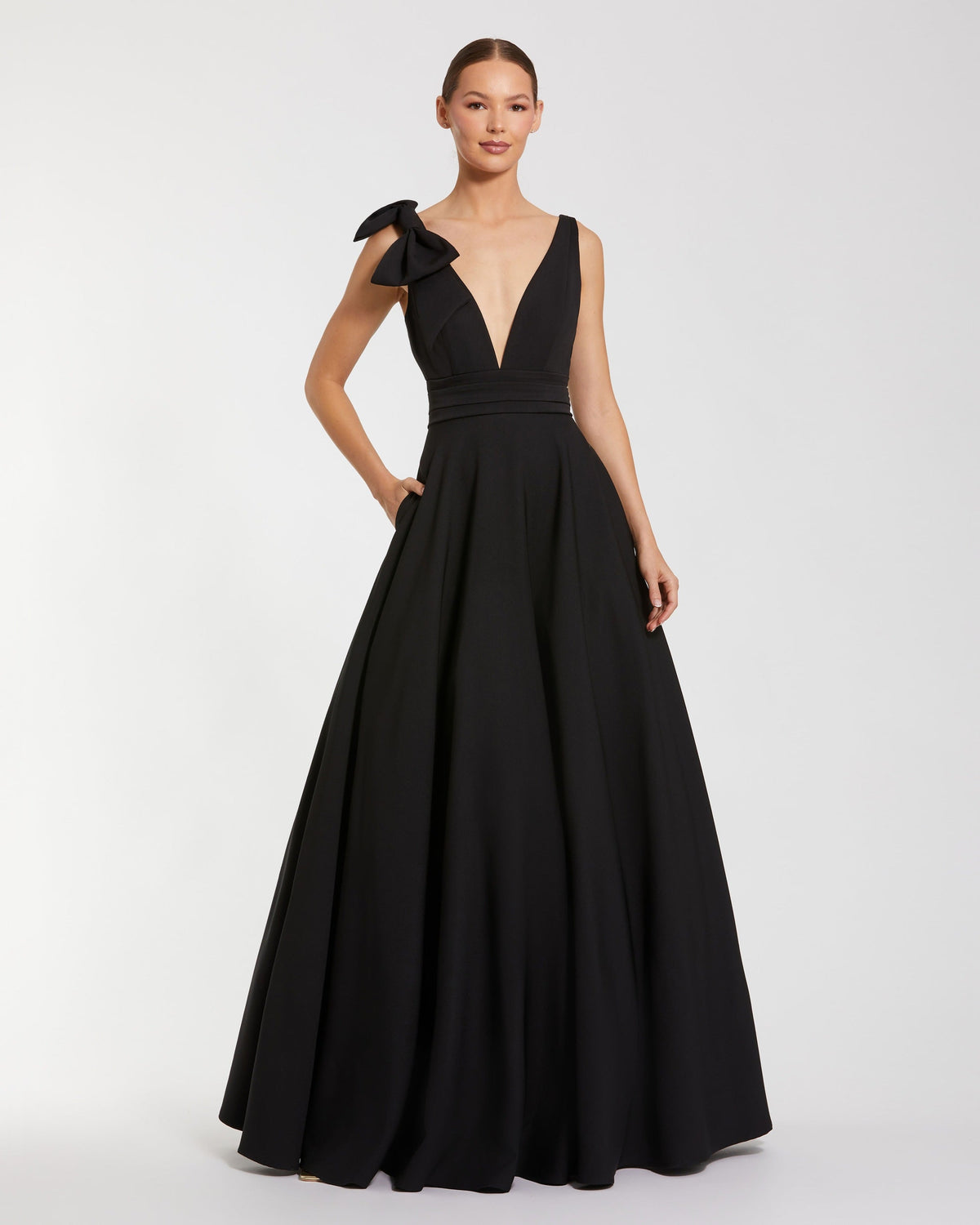 Sleeveless Plunge Neck Ball Gown With Bow Detail